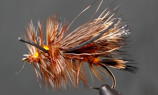 Stimulator fly with rubber leg in orange